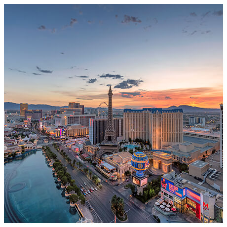 Aerial view of the Las Vegas strip lit up at sunset 