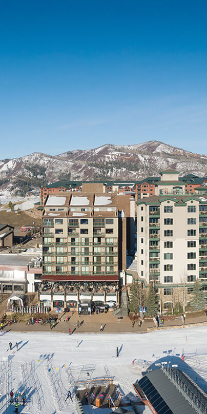 Mountain resort with a backdrop of mountains and trees