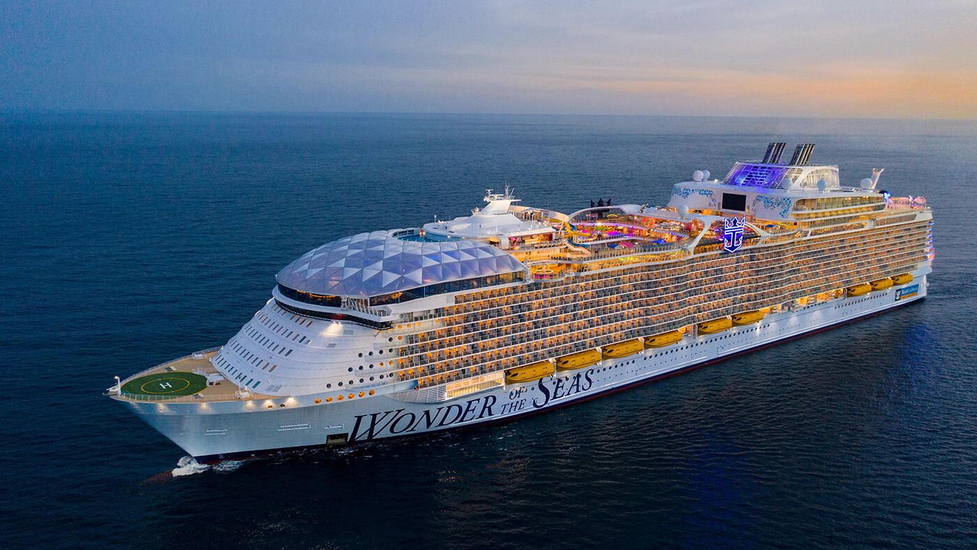 Wonder of the Seas cruise ship on the open waters at sunset